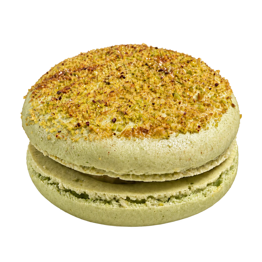 Green Ember in profile: pistachio ganache visible between two green shells
